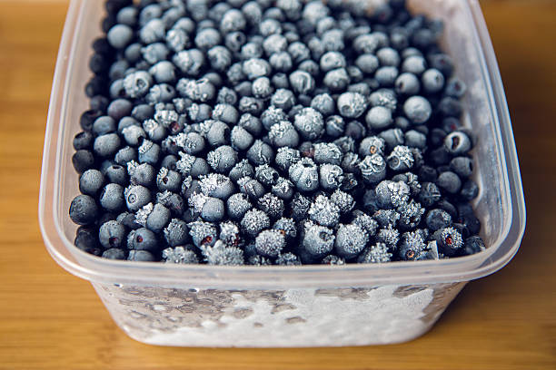 istock frozen blueberries with frost 579249160