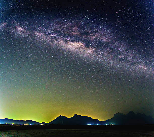 istock Milky way galaxy over mountain, Thailand. 579251322