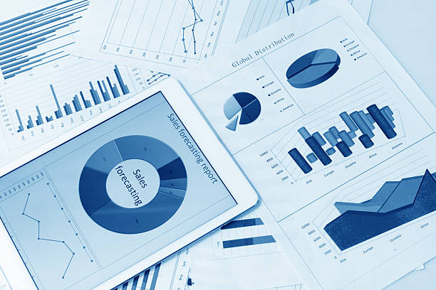 istock Financial charts on the table with tablet 579251878