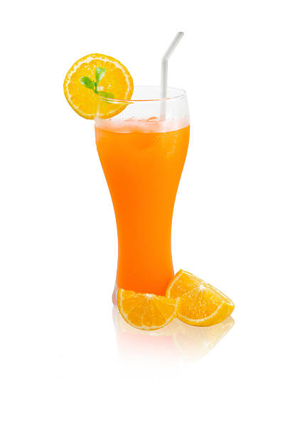 istock Orange juice in glass isolated on white background 579252906