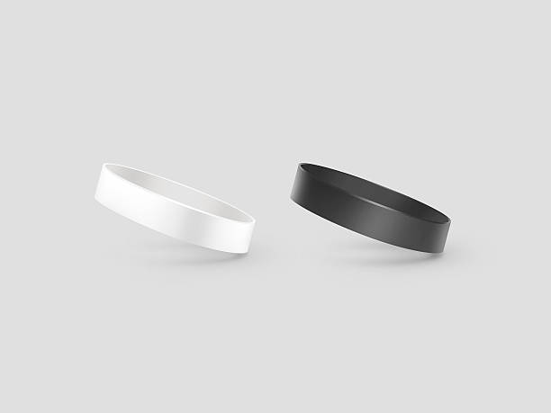 istock Blank white and black rubber wristband mockup, clipping path, 579255960