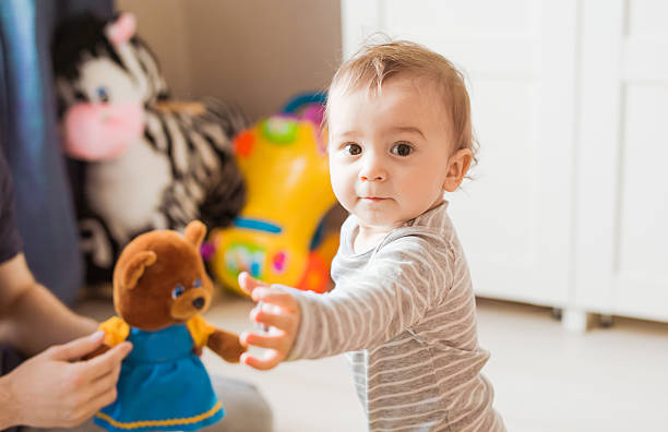 istock Adorable baby boy in bedroom. 579257024