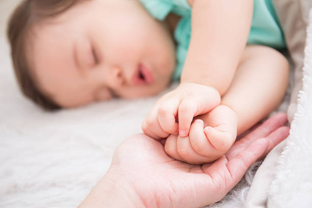 istock baby sleep on the bed 579260712