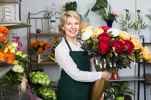 istock Female florist at the work 579262644