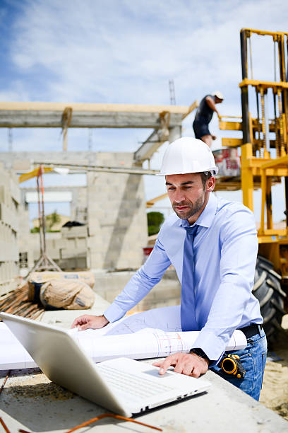 istock portrait handsome young man architect on building industry construction site 579262944
