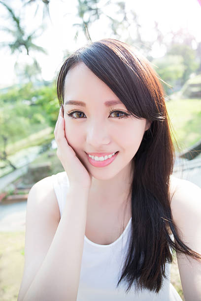 istock young woman smile to you 579263084