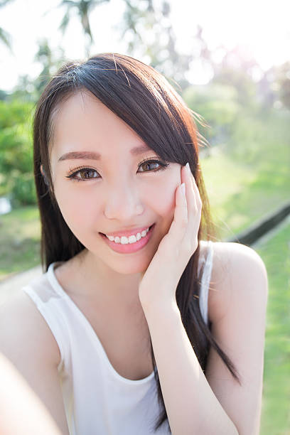 istock young woman smile to you 579263156