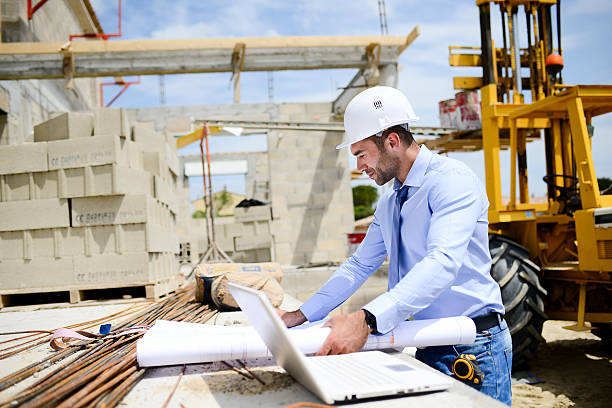 istock portrait handsome young man architect on building industry construction site 579264286