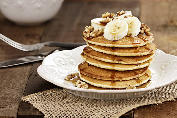 istock Pancakes with Fresh Bananas and Waluts 579265230