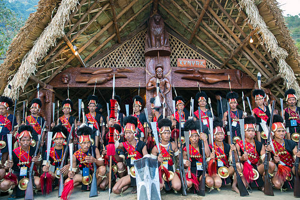 Hornbill Festival in India. Nagaland, India - December 1, 2013: Tribes of Nagaland at the annual Hornbill Festival in Kohima. The Hornbill is also known as the Festival of Festivals’. hornbill stock pictures, royalty-free photos & images