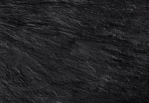 Textura de piedra fondo negro photo