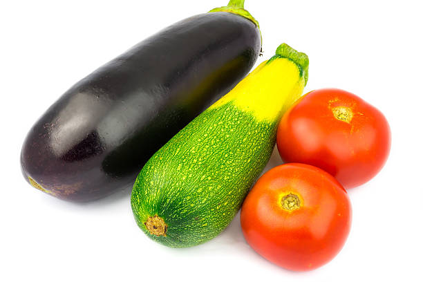 istock Group of vegetables, tomato, zucchini, eggplant isolated on white background. 579403640