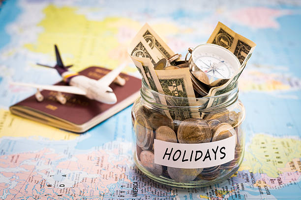 istock Holidays budget concept with compass, passport and aircraft toy 579404828