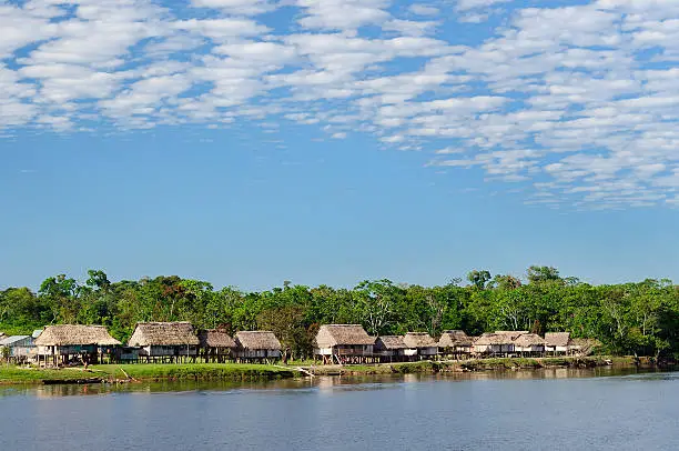 South America, Amazonas landscape. Typical indian tribes on the river bank the Amazons