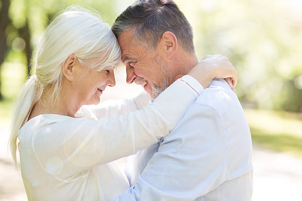 istock Senior couple standing outdoors 579406350