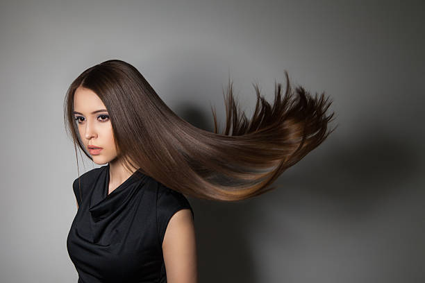 istock Beautiful model with smooth flying hair 579407002