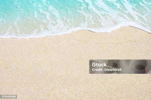 Soft Wave Of Ocean On The Sandy Beach Stock Photo - Download Image Now - Beach, Sand, Water's Edge