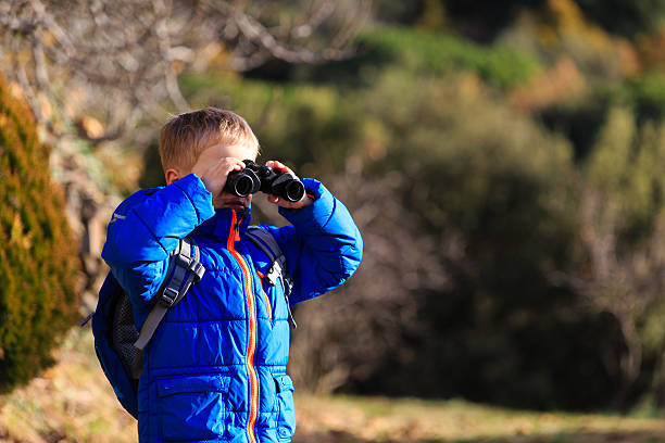 istock little explorer hiking in autumn mountains 579409866