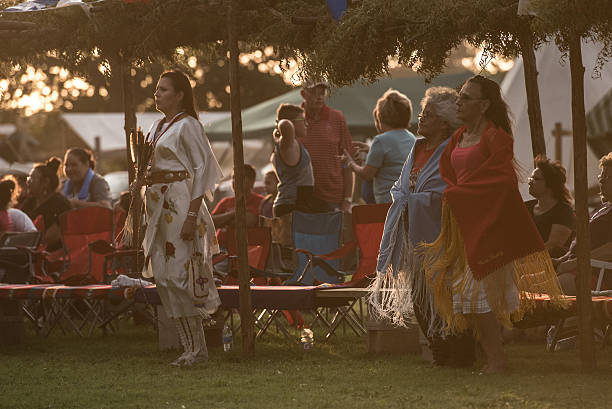 Kiowa women, performing ceremonial dance at a Gourd Dance pow-wow. Carnegie, Oklahoma, U.S.A. - July 2, 2016: Kiowa women, performing ceremonial dance at a Gourd Dance pow-wow. kiowa stock pictures, royalty-free photos & images