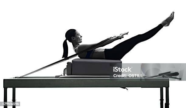 Woman Pilates Reformer Exercises Fitness Isolated Stock Photo - Download Image Now - Pilates, Pilates Machine, Women