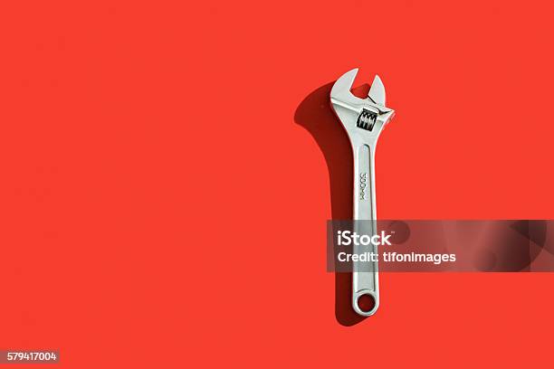 Silver Wrench Stock Photo - Download Image Now - Colored Background, Work Tool, Wrench