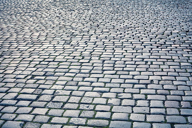 istock Vintage toned cobblestone street. 579417646