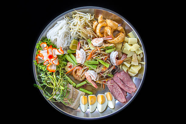 istock Papaya salad with eggs and vegetables on a tray 579420372