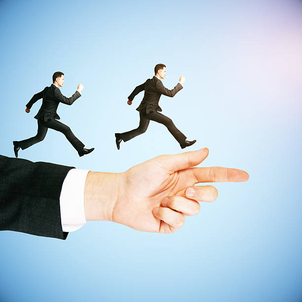 istock Businessmen on arm guidance concept 579420436