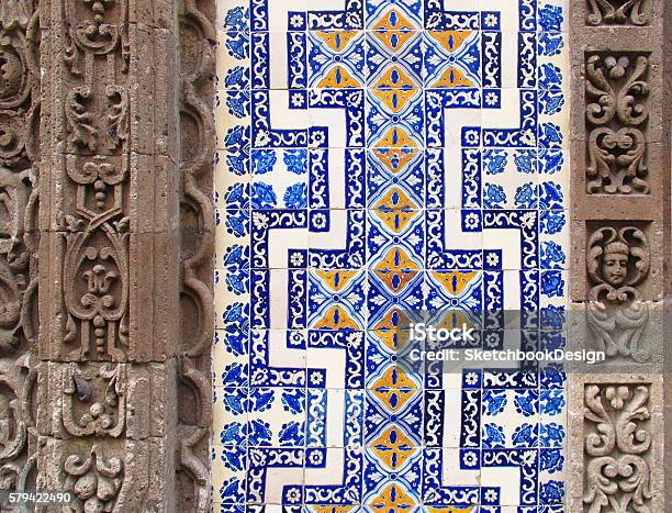 Detail Of Mexican Building With Carved Stone And Painted Tiles Stock Photo - Download Image Now