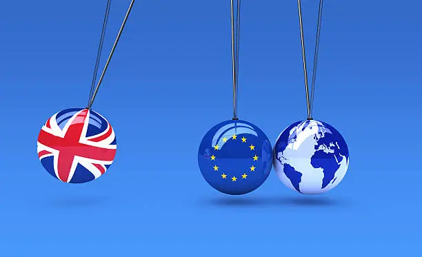 Brexit global business consequences concept with Union Jack, EU flag on balls and world map globe 3D illustration.