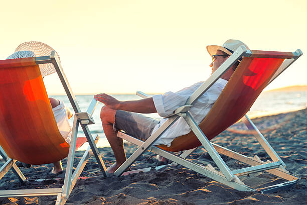 istock Couple on the beach 579423046