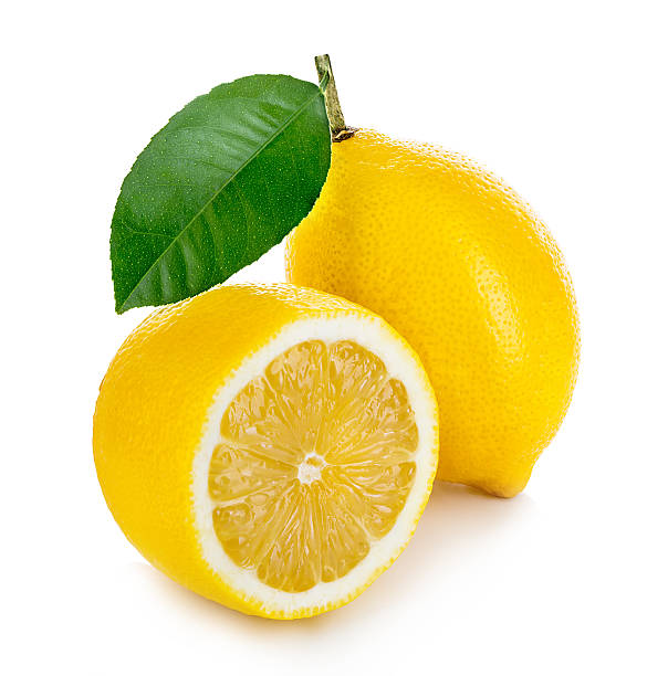 istock Lemon with green leaf isolated on white background 579423598