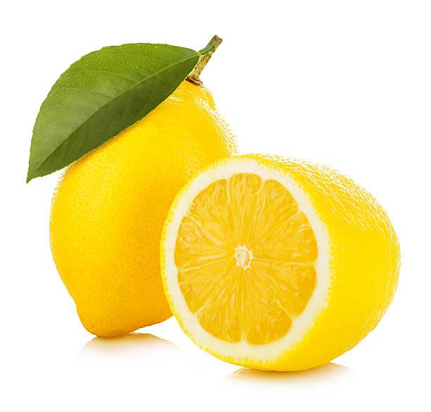 istock Lemon with green leaf isolated on white background 579423624