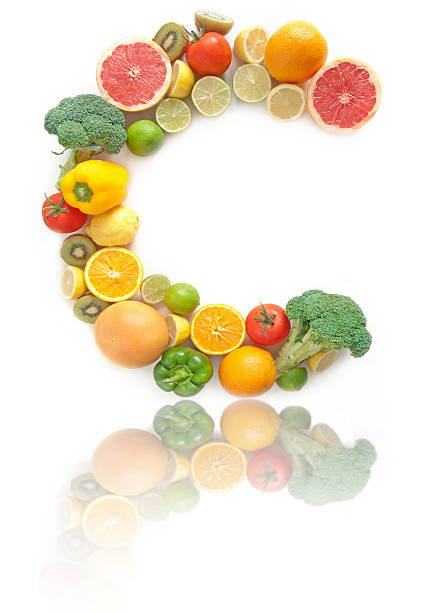 vitamin c rich fruits and vegetables alphabet - vitamin a letter a food orange imagens e fotografias de stock