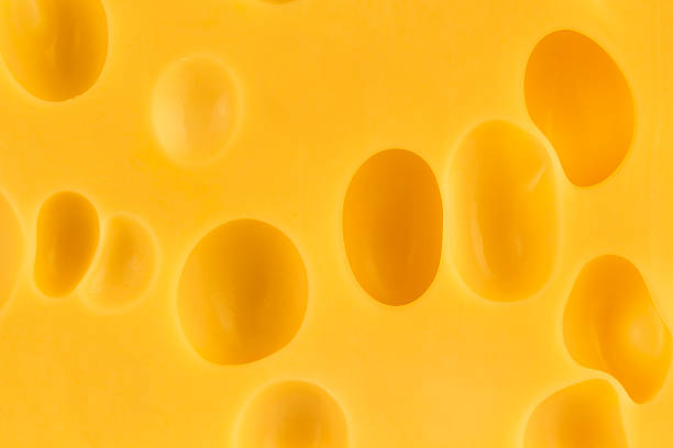 istock Texture of swiss cheese, close-up 579425032