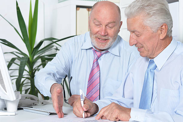 istock senior Business people working together 579425214