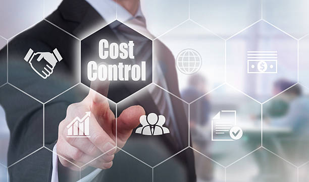 businessman selecting a cost control concept button - cut price imagens e fotografias de stock