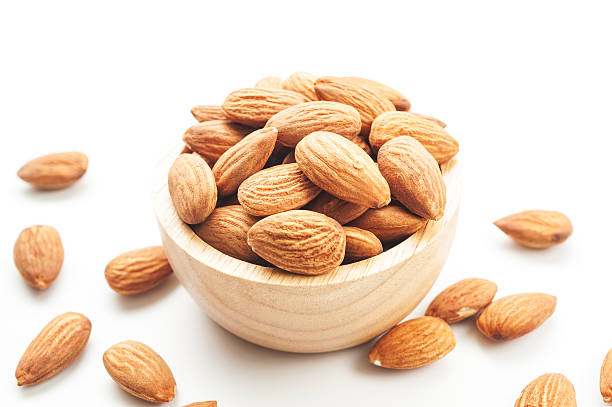 istock Almond snack fruit in wooden bowl 579426160
