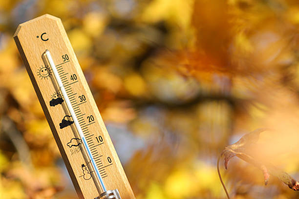 istock nice weather in the autumn shown with mercury thermometer 579427002