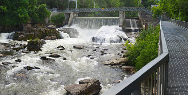 hydroelectric dam on river waterfalls, power plant dam on river, hydroelectric power plant waterfalls in Sherbrooke Qc sherbrooke quebec stock pictures, royalty-free photos & images