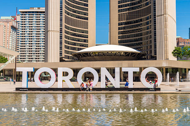 Montreal, Canada - July 4, 2016: 3D Toronto sign and Nathan Phillips Square in Toronto, Canada