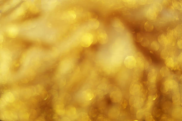 istock Defocused abstract golden light bokeh background. 579432978