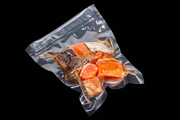 vacuum packaged pieces of salmon stock photo