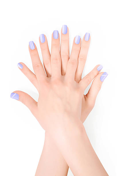 istock Hands with art manicure on white with clipping path 579436904