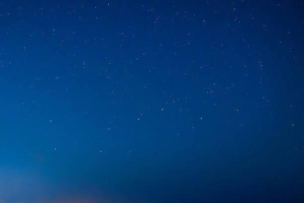 istock Blue dark night sky with many stars 579438624