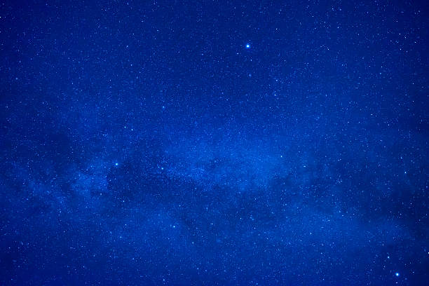 istock Blue dark night sky with many stars 579439886