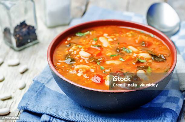 Tomatoes Spinach White Beans Millet Soup Stock Photo - Download Image Now - Lima Bean, Soup, Cooking