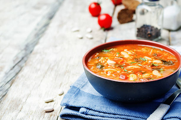 istock tomatoes spinach white beans millet soup 579441562