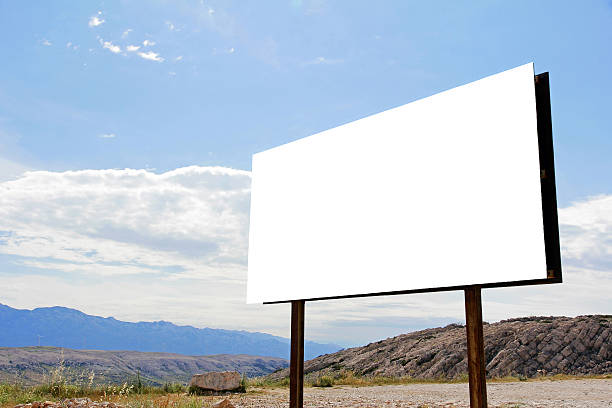 istock large, empty, white advertising sign in the countryside 579442174