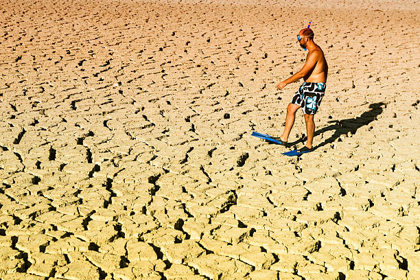 istock young practicing diving in a dry swamp 579442216